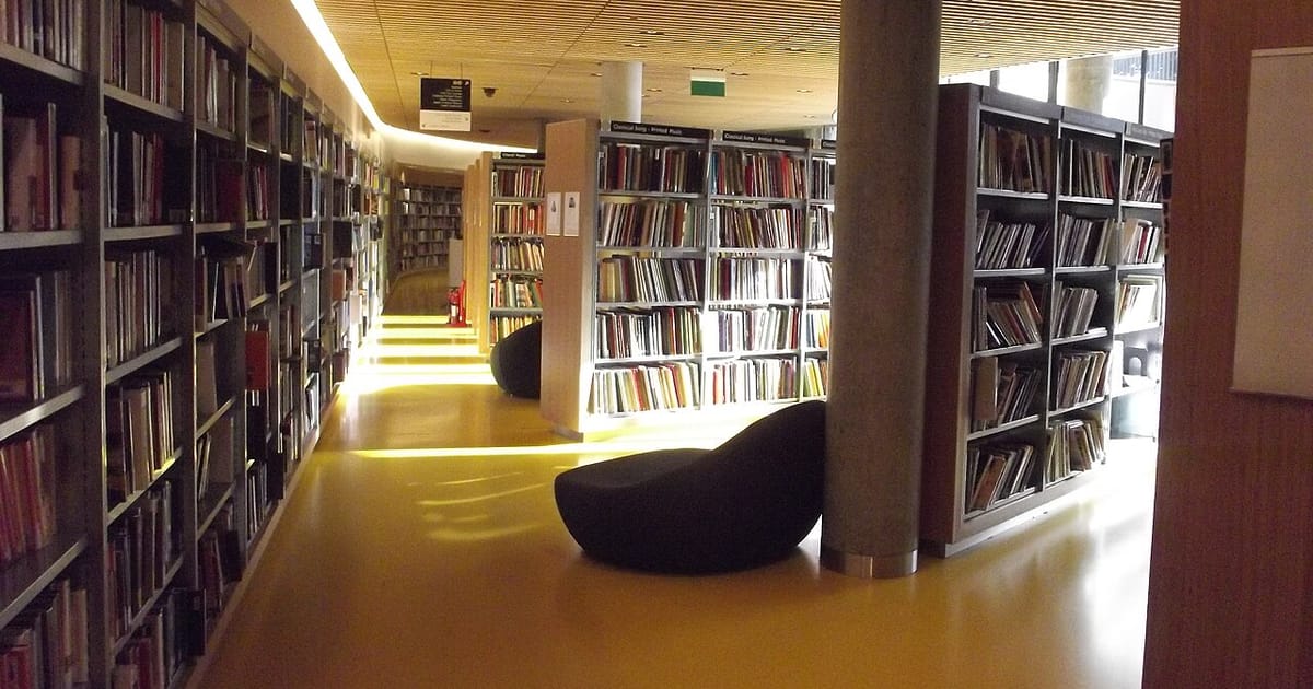 Shelves of books inside the Library of Birmingham